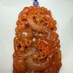 An exquisitely hand-carved dragon pendant